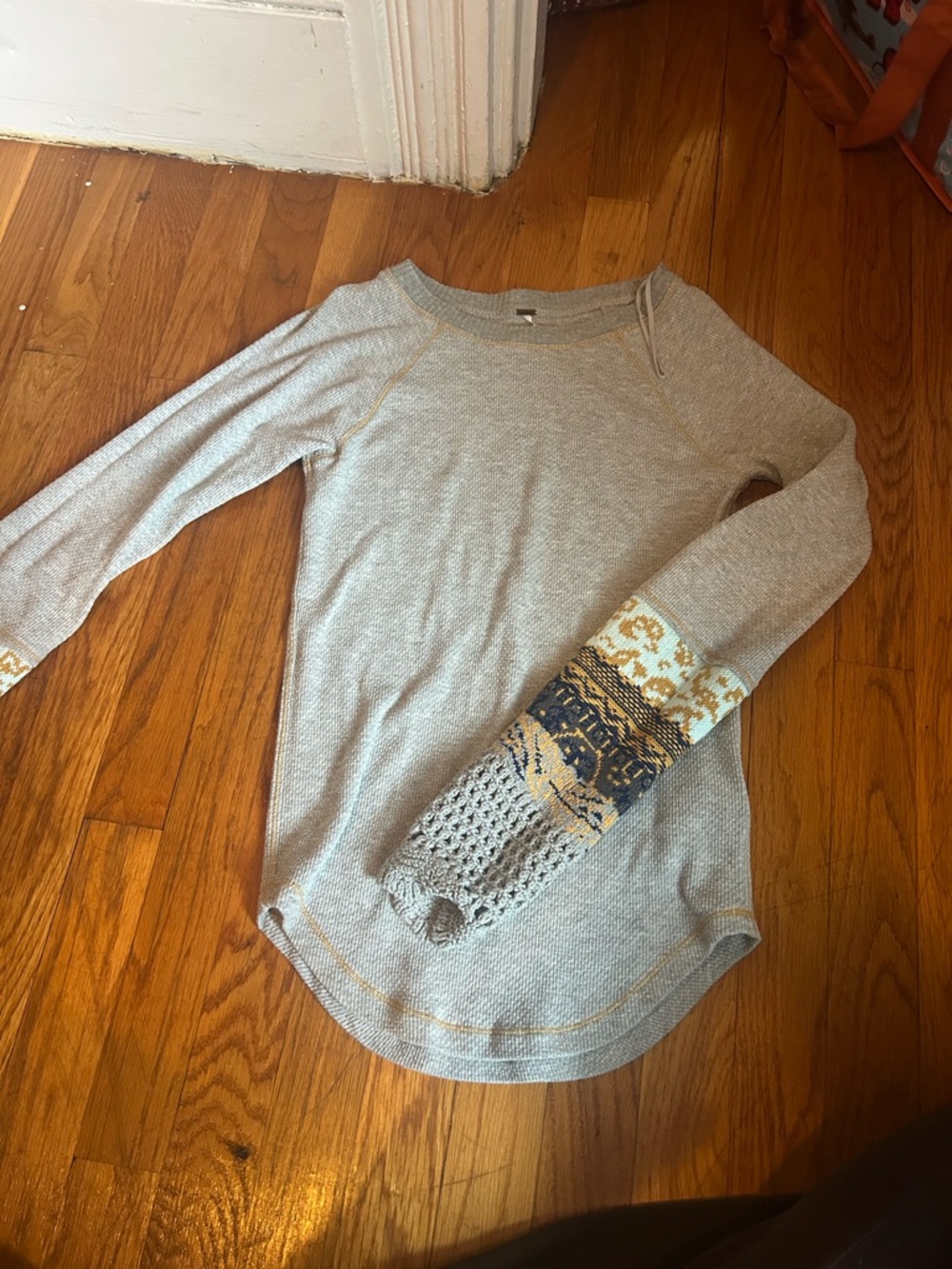 Free People light gray knit top with patterned cuff